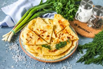 Bir tavada peynirli tortilla